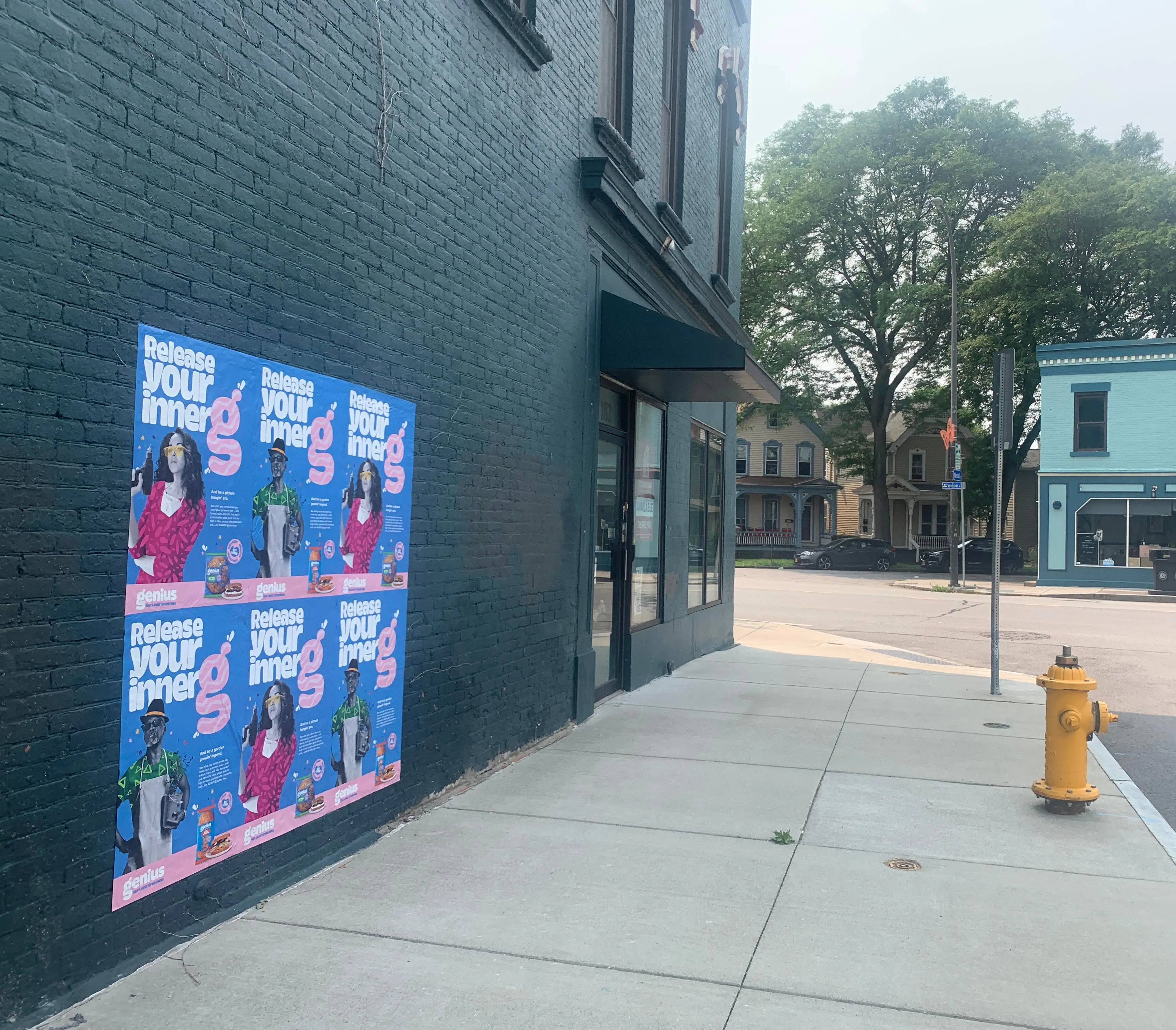 Genius wheatpaste ad on Savannah Street and Monroe Ave